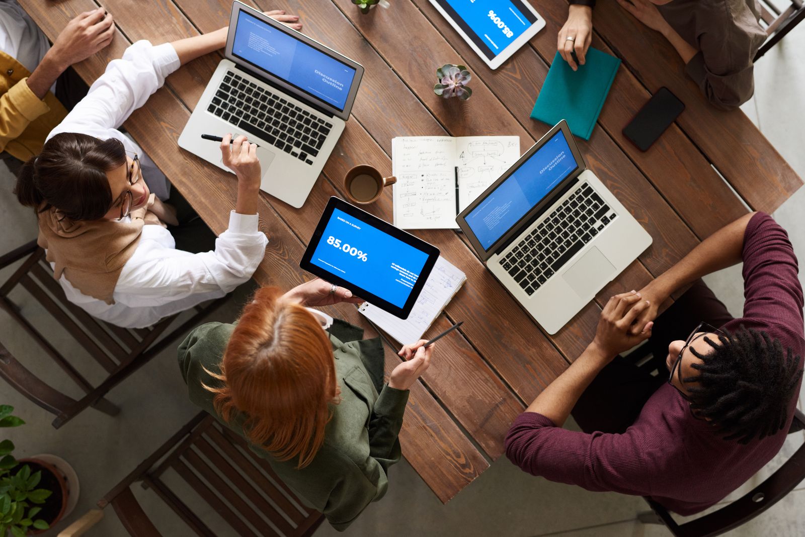 Developers collaborating over code and system architecture